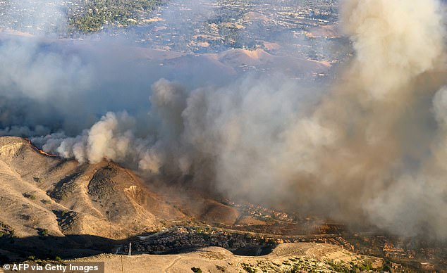 A new apocalyptic, fast-moving inferno, dubbed the Kenneth Fire, threatens to rip through desirable neighborhoods (pictured the Calabasas area where the Karashian's live)