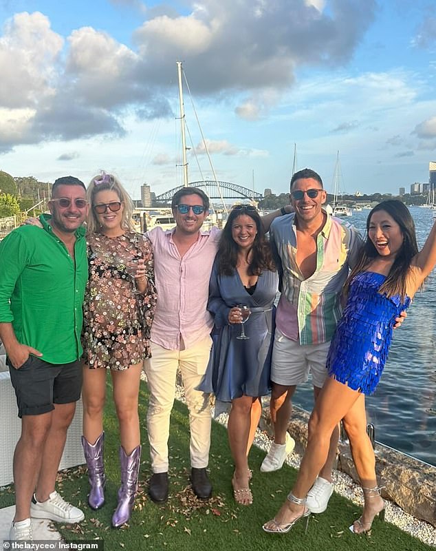 The carpenter was briefly in Sydney over the New Year period and watched the fireworks with friends from a waterfront house (Lee is in the second photo from the right)