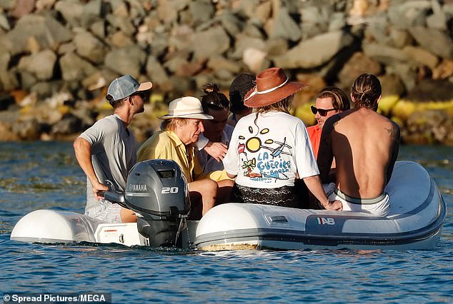 After soaking up the sun in Barbados, the group headed to St. Barts and hopped off the luxury yacht to enjoy a day at the beach.