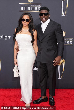 The star-studded event will see top NFL players and their wives walk the red carpet (pictured are Tyreek Hill and Keeta Vaccaro)