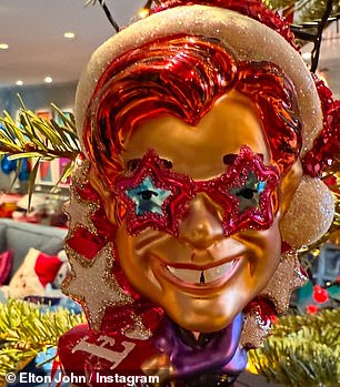 The singer shared photos of his iconic tree decorations of the Rocketman himself