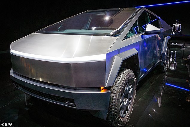 The updated look of the Model Y is very much a reflection of the Tesla Cybertruck (pictured), especially the wraparound light clusters front and rear