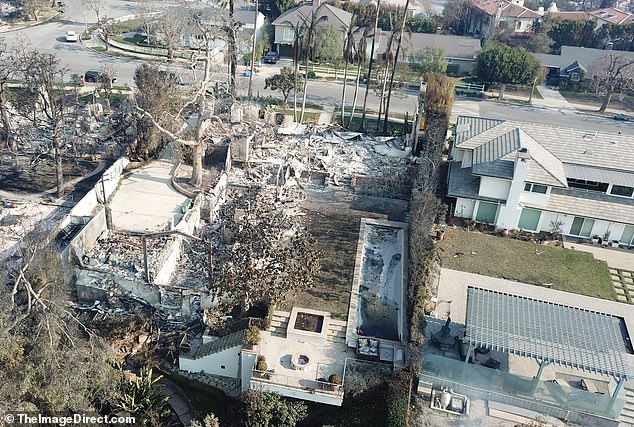 The house next to the couple miraculously survived the flames, as did some houses across the street