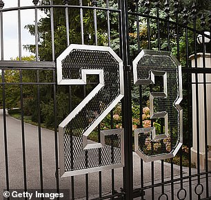 His old jersey number is on the front gate of Jordan's Highland Park, Illinois mansion