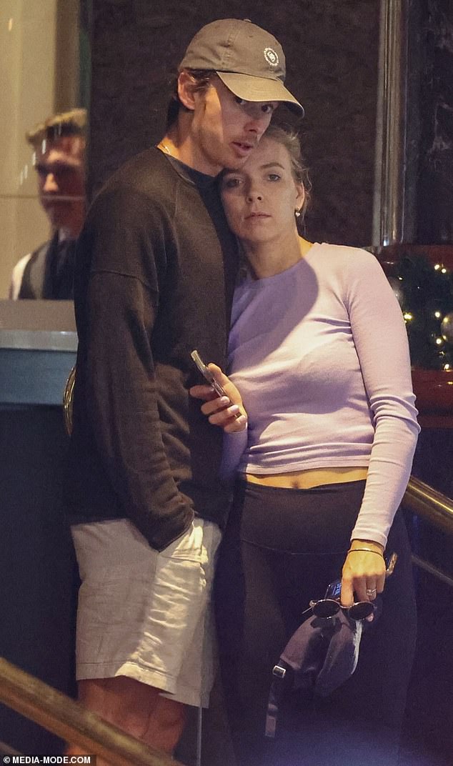 Kyrgios is impressed by Alex de Minaur's maturity as Australia's number one star (pictured, with girlfriend Katie Boulter)