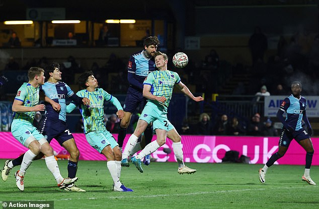 Ex-Pompey man Sonny Bradley headed in the first goal for Wycombe ten minutes later