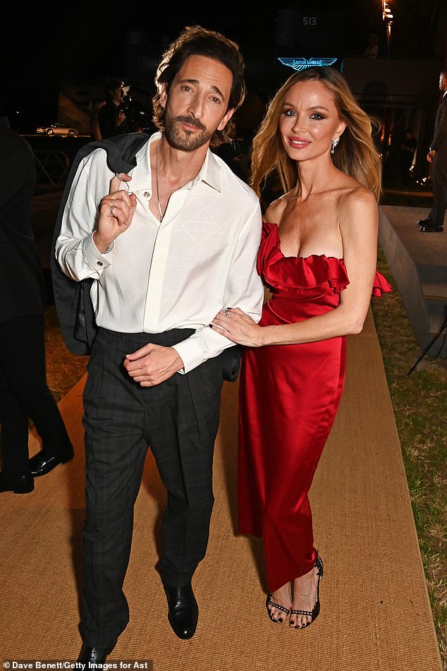 Adrien Brody and Georgina Chapman attend the launch of the new Aston Martin Vanquish on September 2