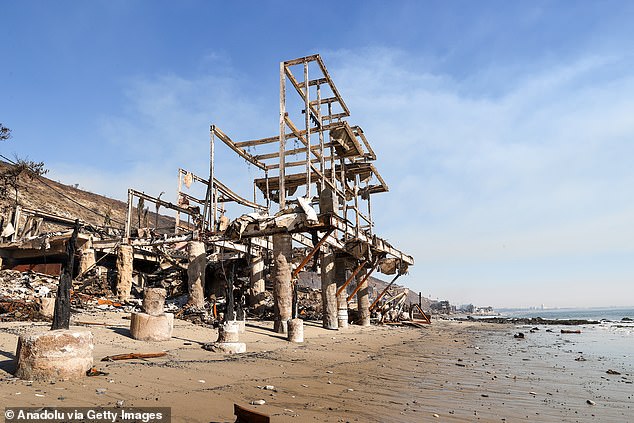 The structures on the beach have burned so badly that nothing is left but the steel frames