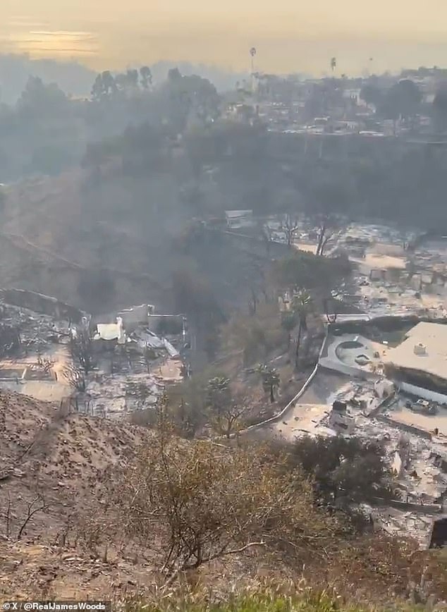 Smoke was still billowing in the distance from other properties destroyed by the fires — which started Tuesday amid strong Santa Ana winds