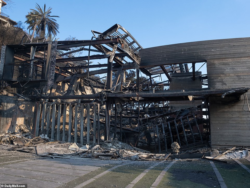 The futuristic four-storey property has collapsed on itself, reducing the house's iconic terraces and two panic rooms to smithereens