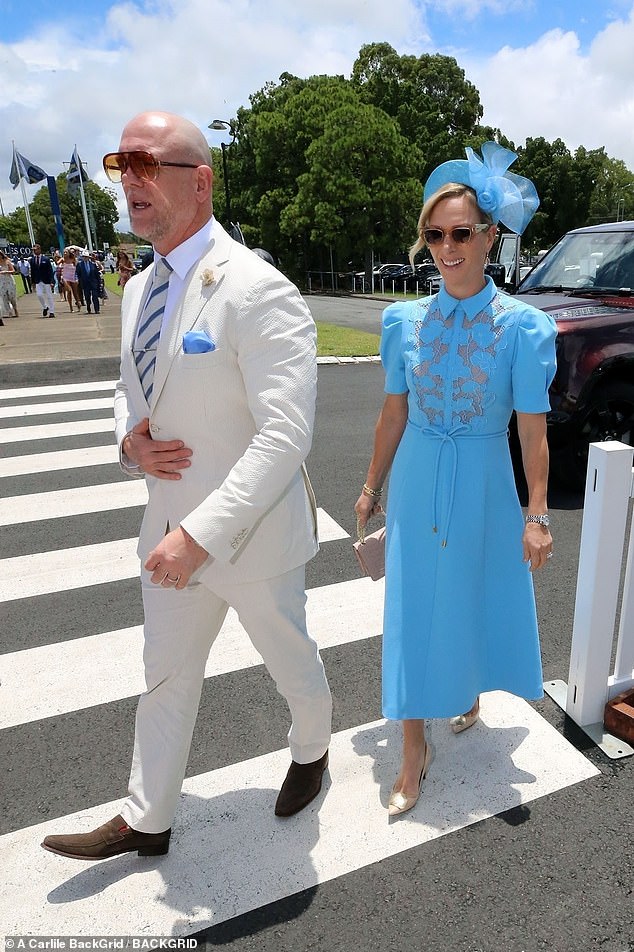 Princess Anne's daughter looked delighted as she attended the glittering event with her husband Mike (left)