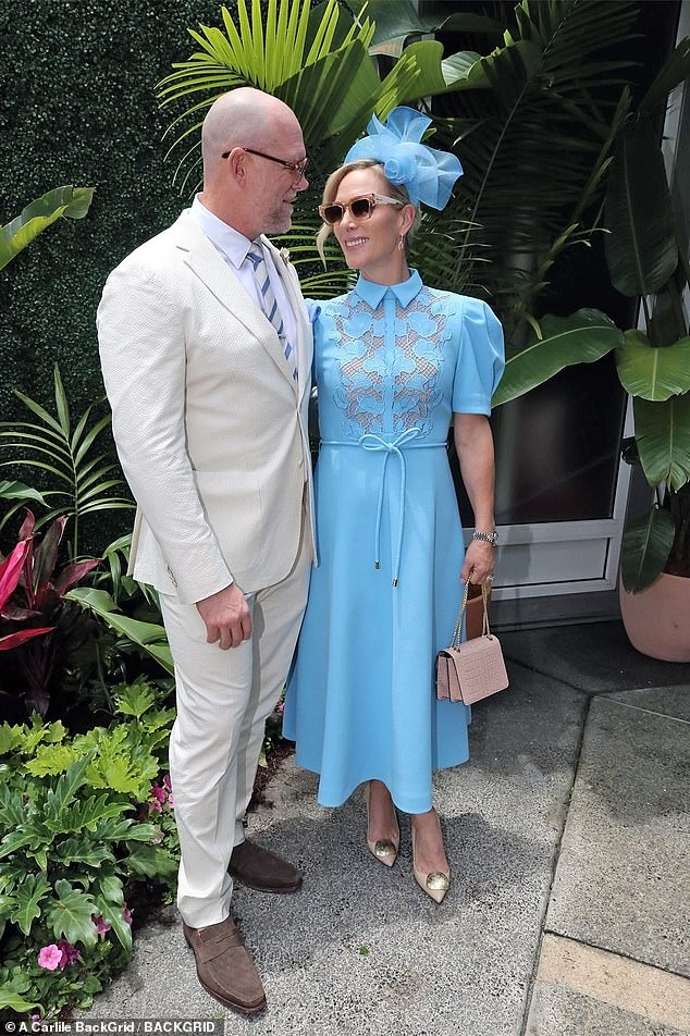 Zara cut an elegant figure in a sky blue dress with a high collar