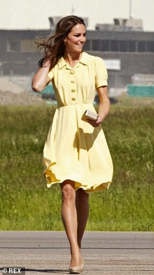 Arriving in Calgary in 20ll, wearing a pastel yellow Jenny Packham dress