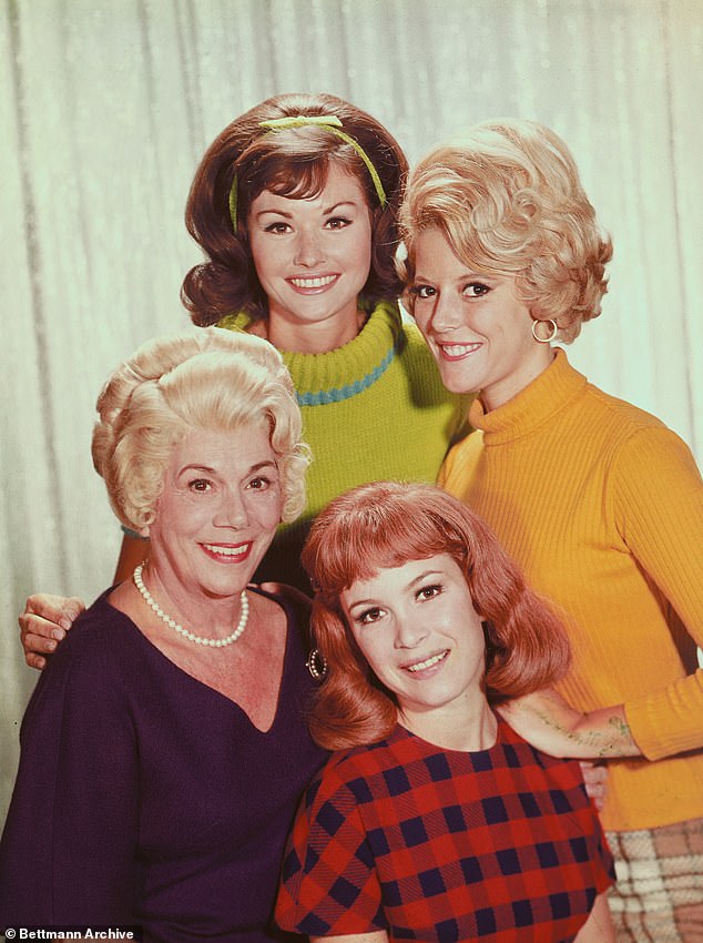 Henning was one of only three cast members to remain for the entire series, appearing in 219 of the 222 episodes; (Lori Saunders and Meredith McRae standing, Kate Bradley and Linda Henning seated)