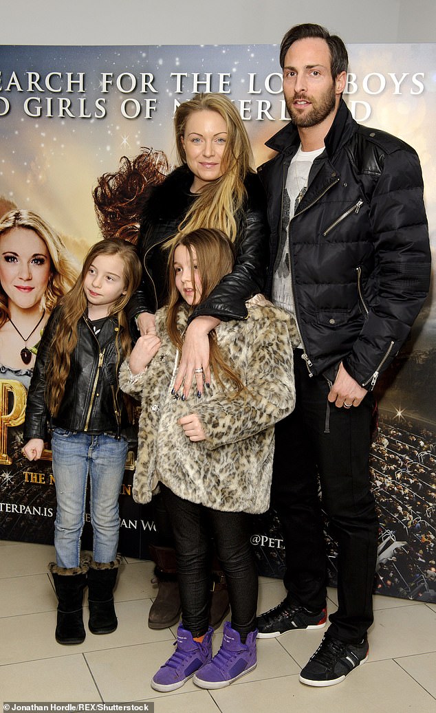 Rita and her ex-husband Theo share two twin daughters together, Jaimee and Maiya (all pictured in 2014)