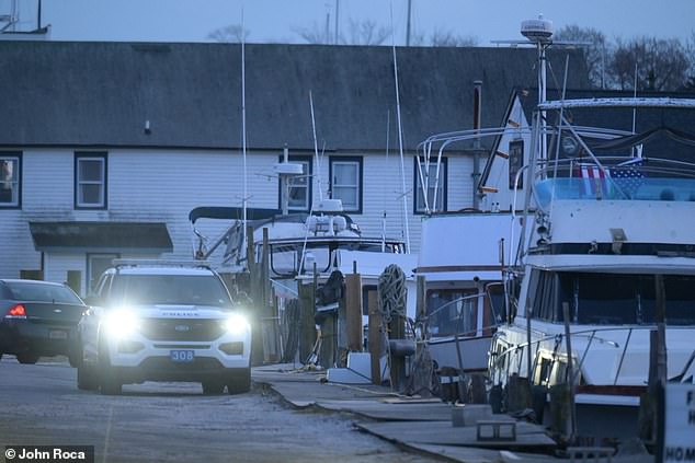 Pictured: Police investigating Whitecap Marina