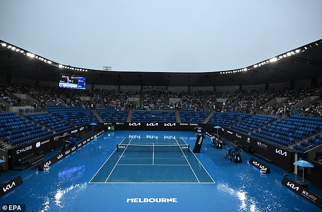 Rain halted play on the outdoor courts early on the first day of the Australian Open