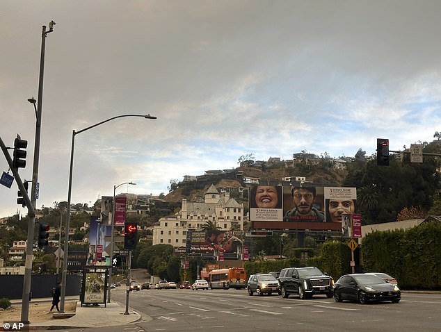 The luxurious hotel was a temporary home for pop princess Britney Spears, movie star Marilyn Monroe and famous film director Quentin Tarantino. In the past, Monroe has also been a frequent guest at the hotspot, which has been a haven for celebrities and entertainment industry elites since it was first converted into a hotel in the 1930s; Chateau Marmont pictured with smoke filling the air from the Palisades Fire on Wednesday morning