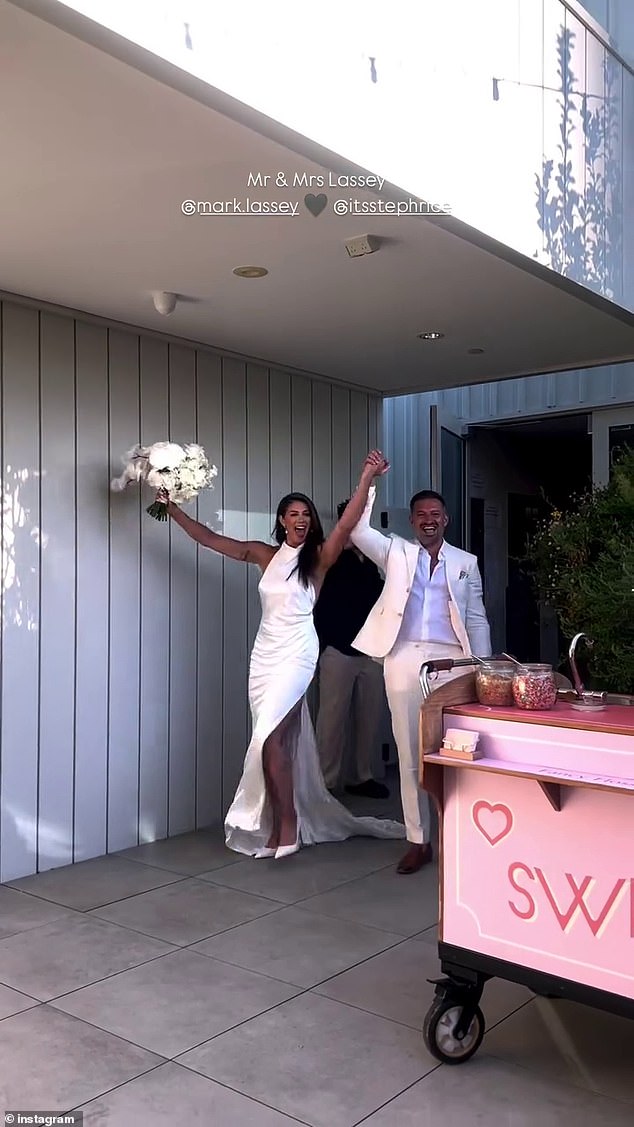 The bride and groom emerged hand in hand to greet their party