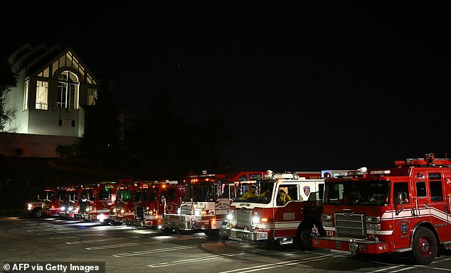 LAFD's highly exclusive Bel Air neighborhood is feared to face new threats - LAFD emergency vehicles are parked next to Bel Air Church as the Palisades Fire rages