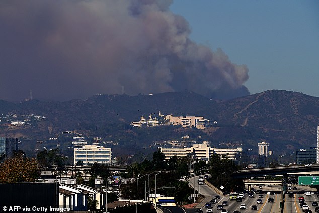 There are also concerns about the risks to the 125,000 artificial worms stored at the Getty Center art museum in the LA mountains and seen here with clouds of smoke hanging above them.