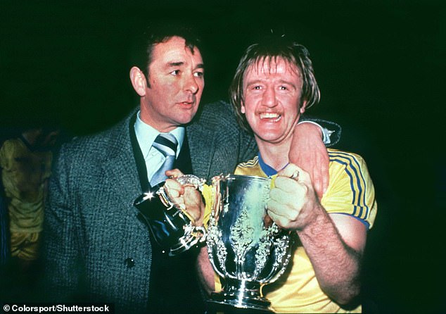 Clough, pictured with captain Kenny Burns, after Forest's League Cup final victory over Liverpool in 1978