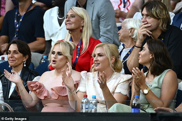 The pair sat together in the star-studded crowd