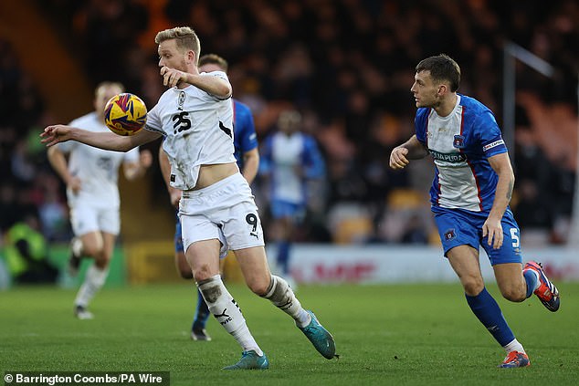 Jayden Stockley is the youngest player to play for Bournemouth, playing for Port Vale (above, left)