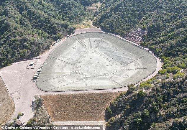 Questions have been asked about why California's 117 million gallon Santa Ynez Reservoir (pictured empty in 2022) has been out of service for almost a year