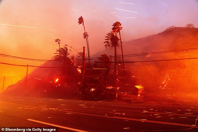 A building burns during the Palisades Fire in the Pacific Palisades neighborhood of Los Angeles, California, USA, on Tuesday, January 7, 2025