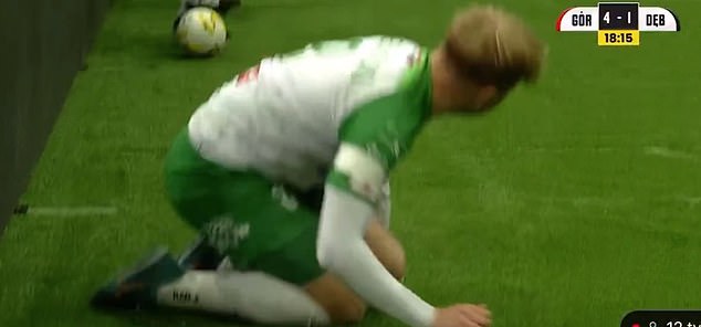 Kuba Siedleckim, from third division club Wisloka Debica, was left in pain after the tackle