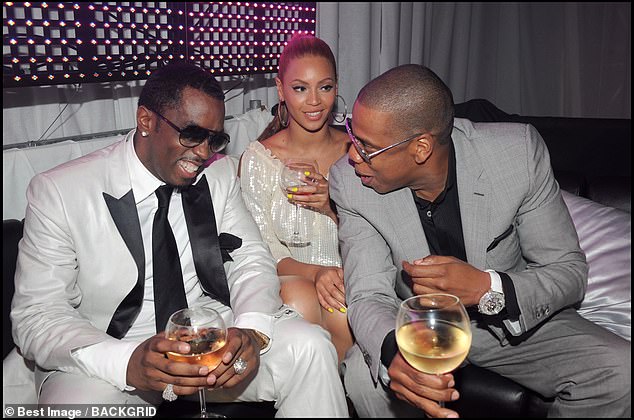 Diddy, Beyoncé and Jay-Z enjoy champagne in the VIP room of the Cannes Champagne Party on May 23, 2008