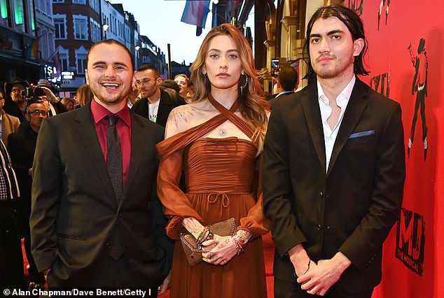 Jackson poses with her brothers Prince Jackson, 27, and Bigi 'Blanket' Jackson, 22, during a performance of MJ: The Musical in London on March 27, 2024