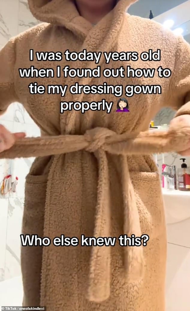 She captioned the clip: “I was one year old today when I discovered how to properly tie my robe. Who else knew this?'