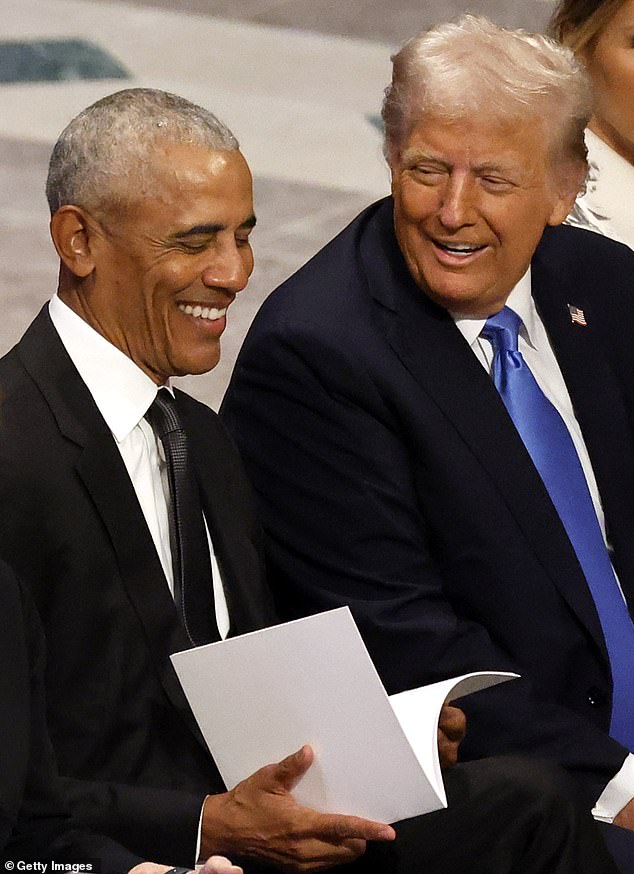 The pair were seen smiling, laughing and chatting as they sat next to each other at Jimmy Carter's funeral in Washington DC.