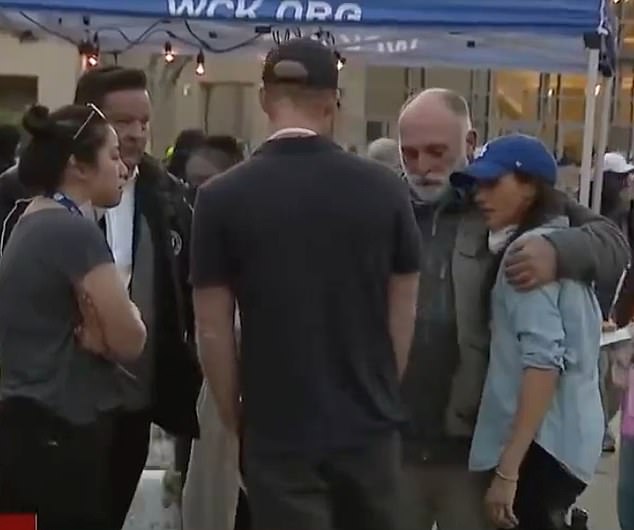 Meghan comforts José Andrés, the founder of World Central Kitchen, as they appeared at the Pasadena Convention Center on Friday