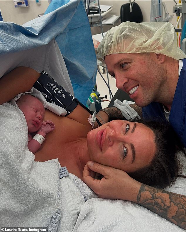 She and her partner James Black beamed in their first family photo with little Archie