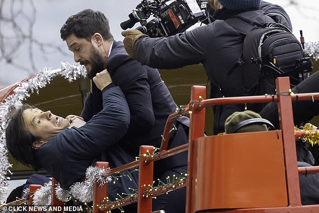 Mark, Kit and Michelle Monaghan closed down London's Whitehall as filming began