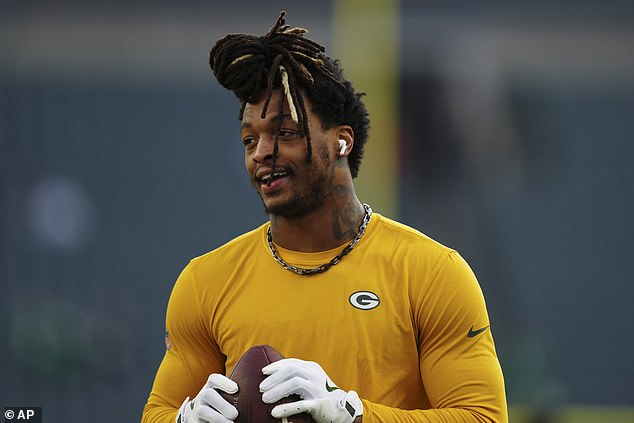 Green Bay Packers safety Xavier McKinney (29) walks onto the field before Sunday's loss