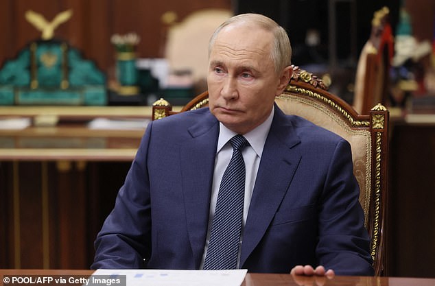 Vladimir Putin (pictured) would have to compete with Donald Trump to gain control of Greenland, a Russian general has said