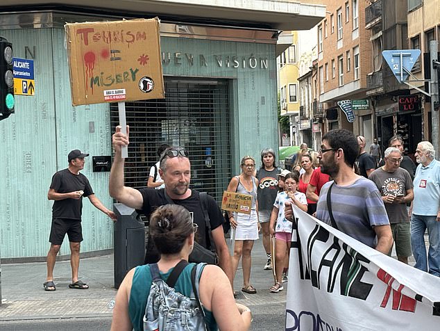 Demonstrators in Alicante protest against overtourism in the Spanish city, in July 2024