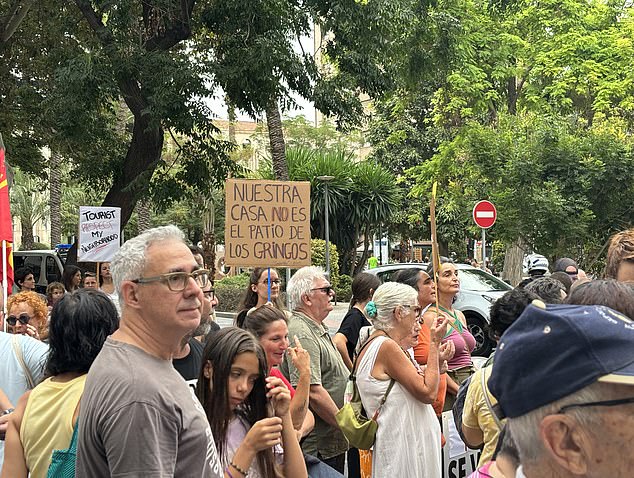 A sign during a protest in Alicante reads: 'our house is not the patio of the gringos'