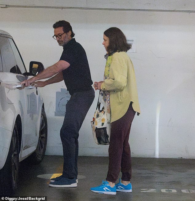 Jackman showed his chivalrous side by opening the car door