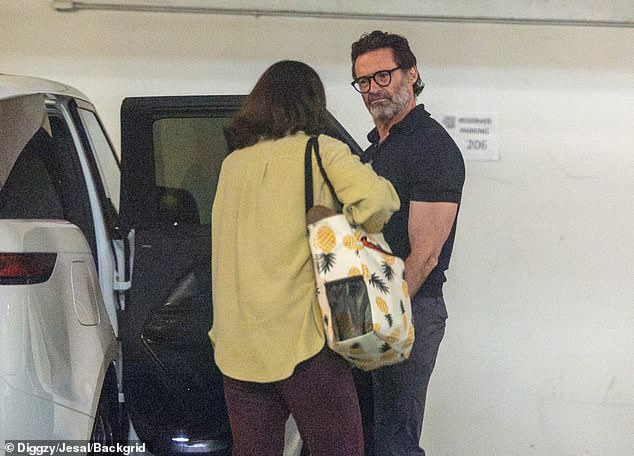 Jackman showed off his muscles in a tight black T-shirt