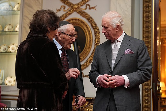 Charles was seen shaking hands with Mr. Goldberg and greeting his wife Shary Goldberg, before the trio chatted at the reception