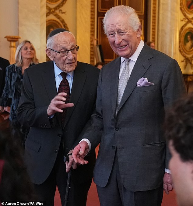 King Charles III addresses guests during a Holocaust Memorial Day reception at Buckingham Palace