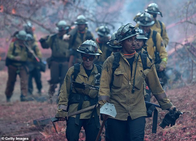 A growing group of firefighters continued to battle the massive infernos in Los Angeles