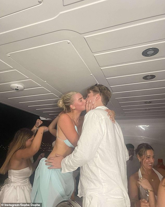 Sophia pictured herself kissing her partner Simon during her 21st birthday party on a yacht in Sydney Harbour, and also uploaded this photo of her partially covering his face