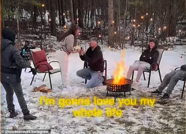 The reality star appeared to get down on one knee during a winter family getaway this weekend, surrounded by glittering slow and loved ones as they sat by a campfire