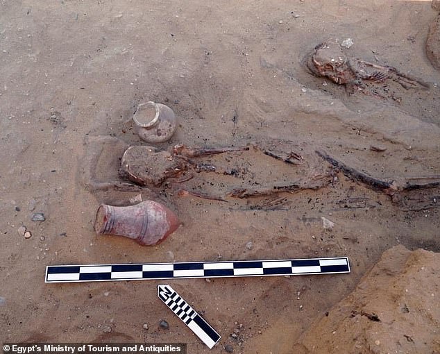 Pottery with Greco-Roman influences discovered in the tomb alongside skeletons, untouched since it was laid to rest about 4,600 years ago